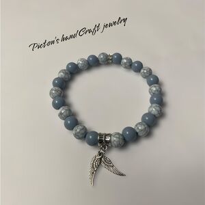 Blue and Silver Beaded Bracelet with Wing Charm